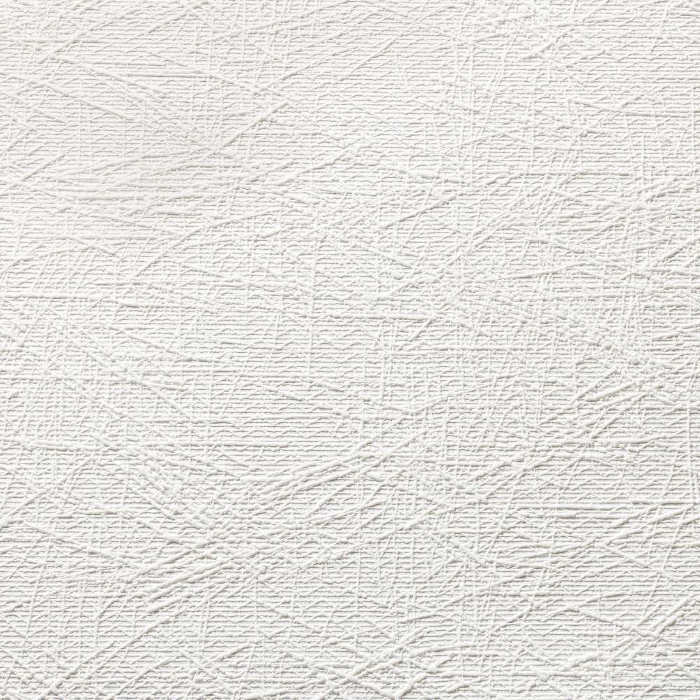 Weiße Wand mit feiner, unregelmäßiger Kreuzschraffur-Struktur.